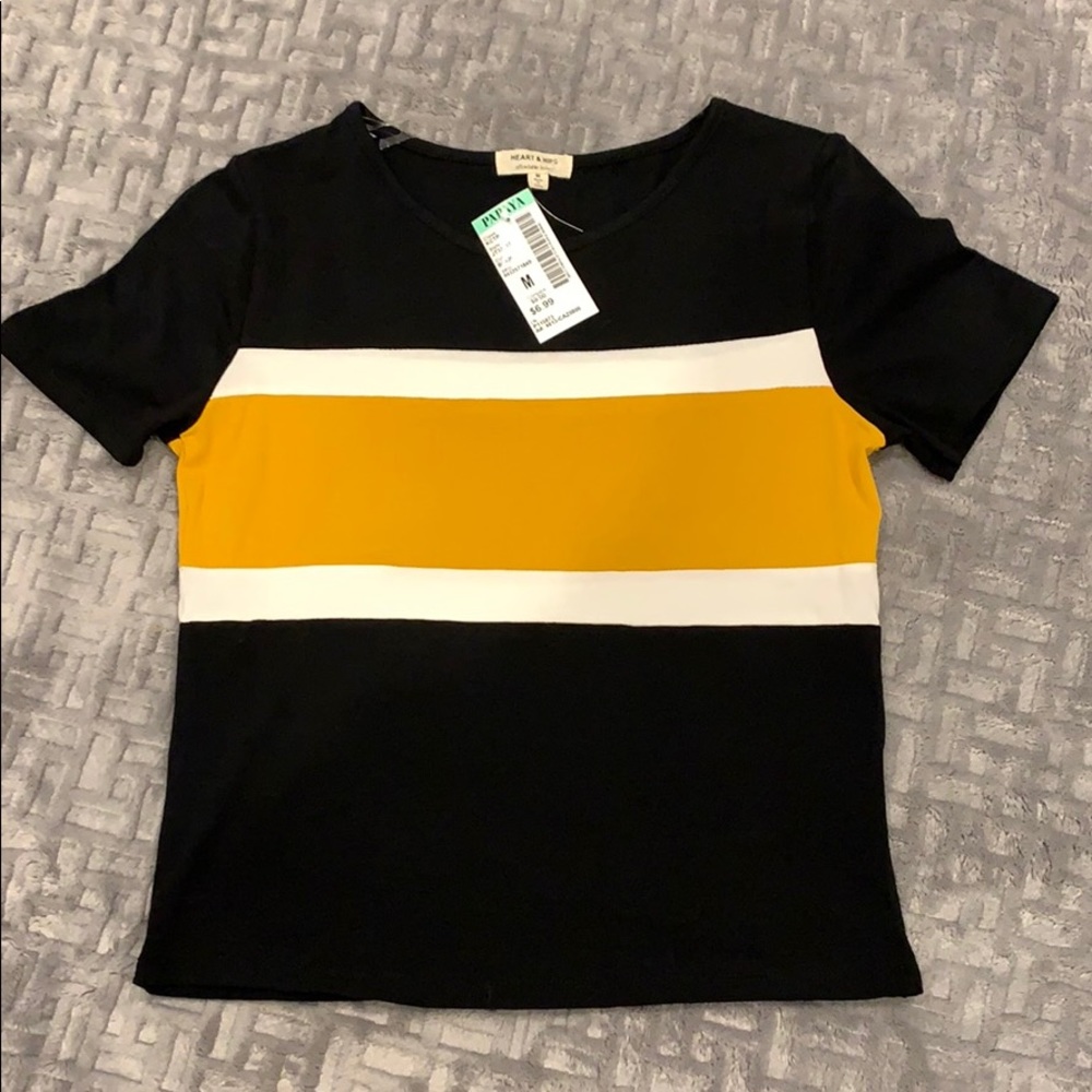black, white, and yellow t-shirt